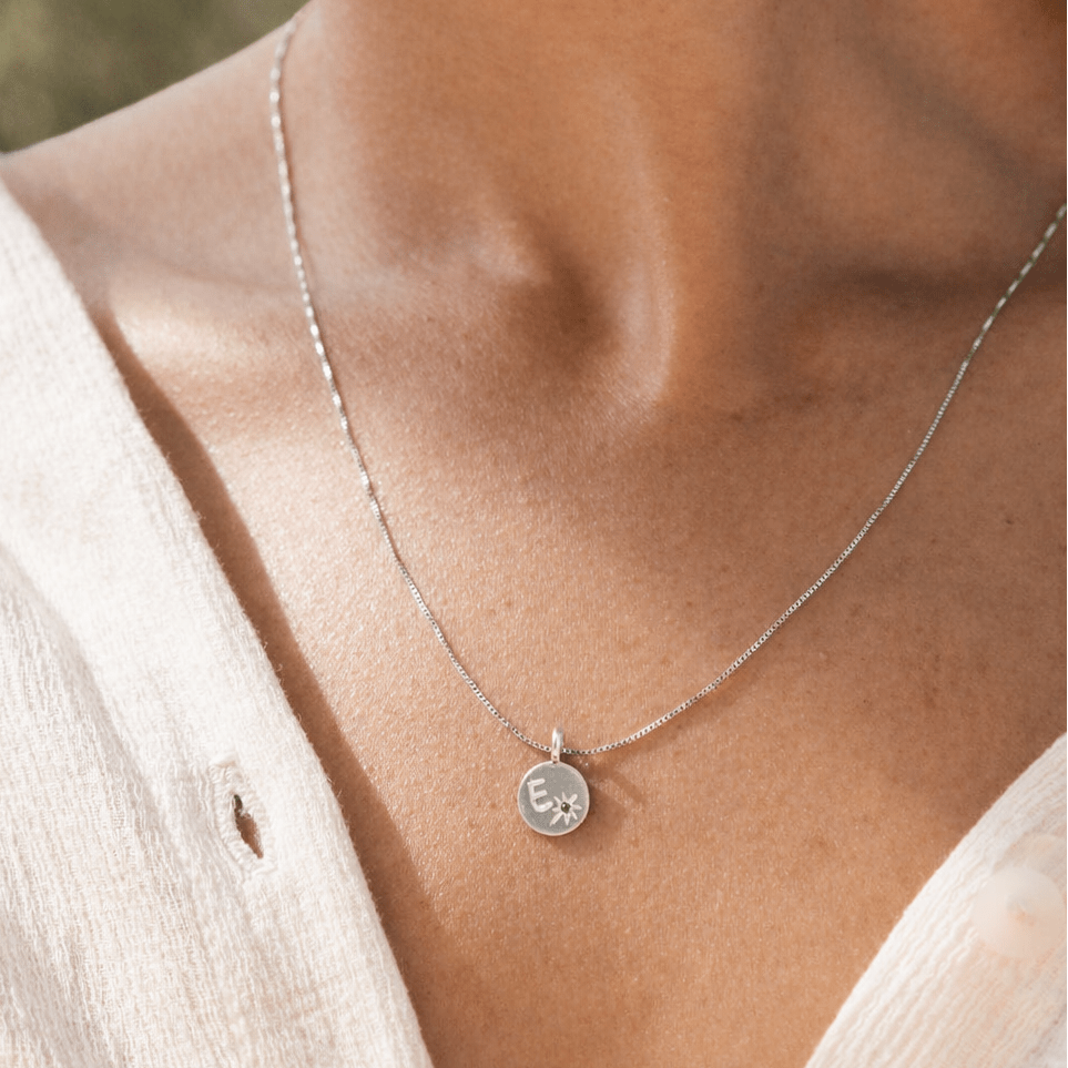 Initial Letter Silver Charm