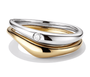 stacked gold and silver rings